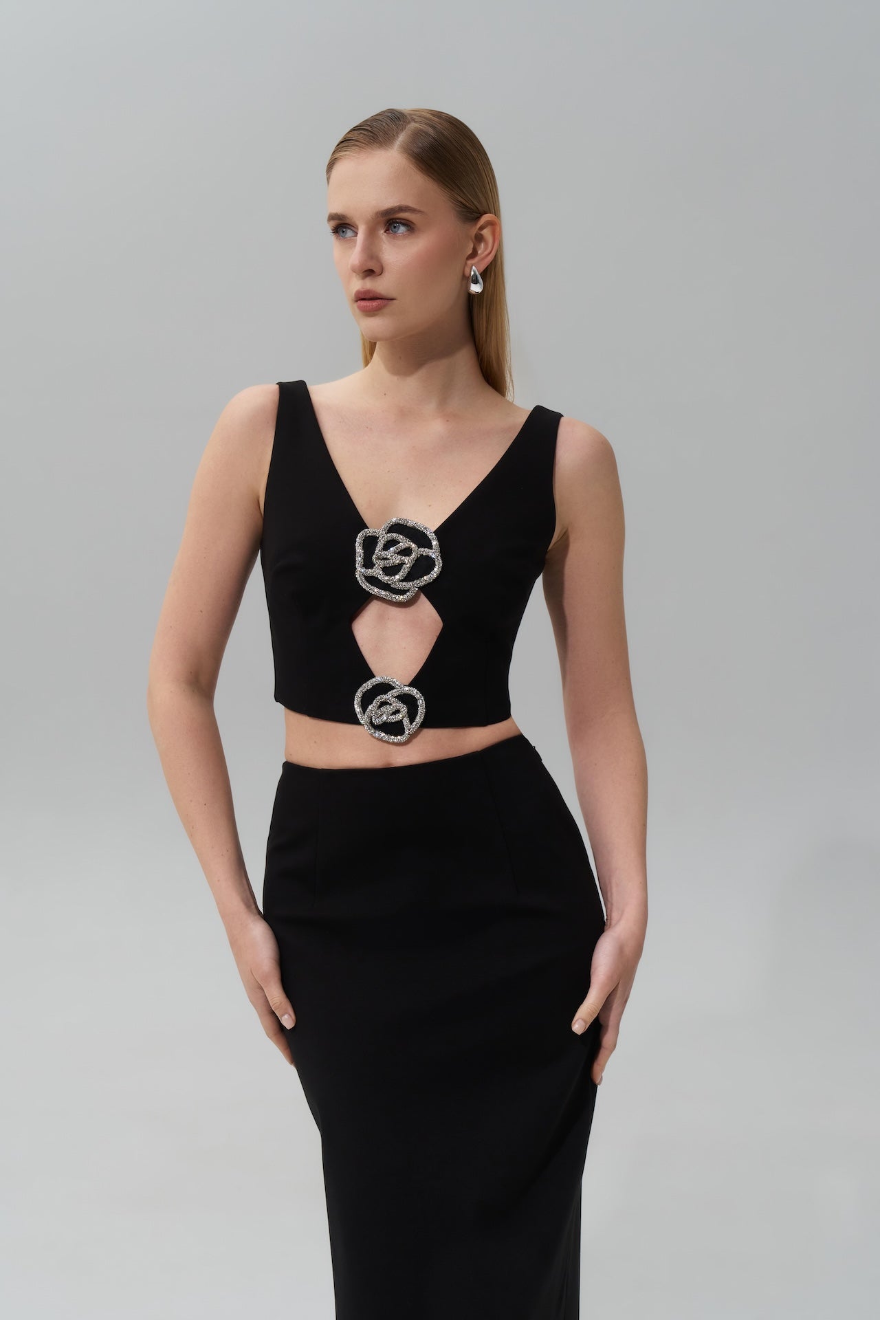 CUTOUT TOP WITH CRYSTAL ROSE EMBELLISHMENT